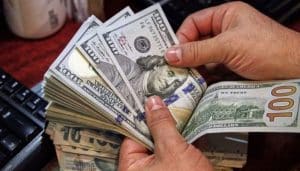 Dollar falls in Interbank, surges in Open Market