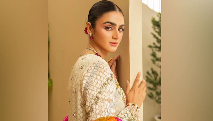hira mani green dress Mac Duggal Green Strapless Satin A Line Midi Dress With 3D Flower #2330  Emerald – Shaide Boutique