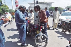 new helmet challan rate in Lahore