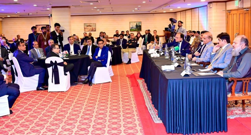 PM Shehbaz shake hands with Imran Khan