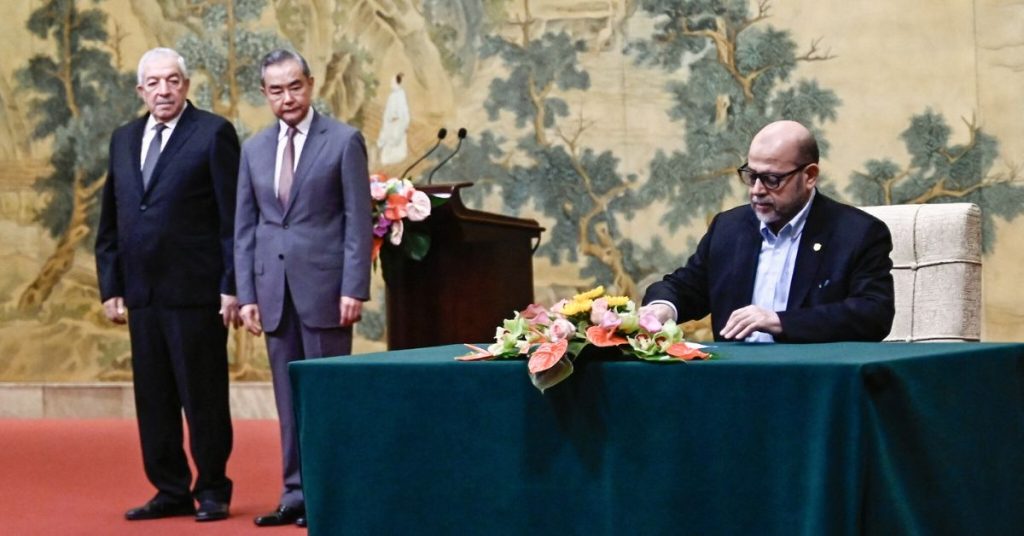 Hamas Fatah sign agreement in Beijing