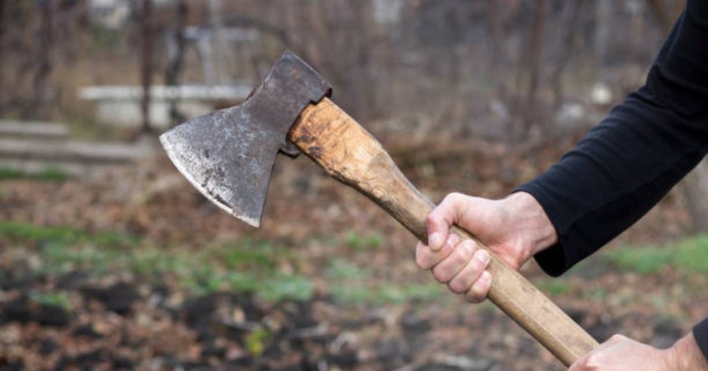 Man arrested for injuring wife with axe