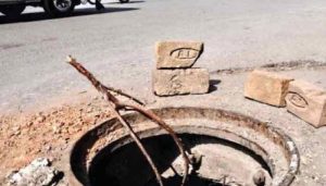 Child dies after falling into open manhole in Lahore