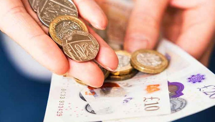 UK to raise minimum wage for millions from April
